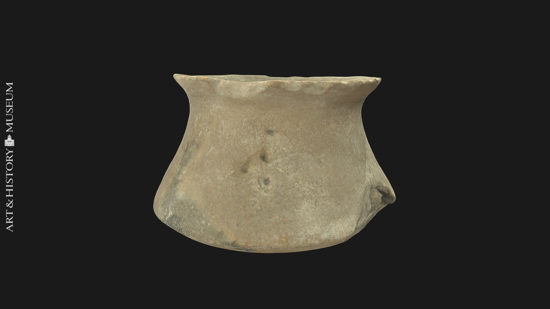 Small carinated vase with flaring rim