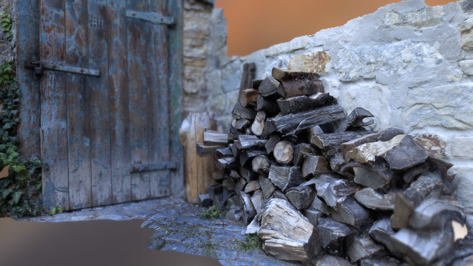 Pile of wooden logs and old wooden door