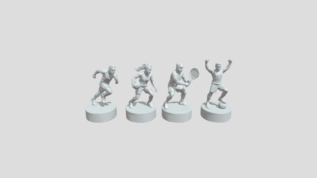 Four colored chess-piece player figurines