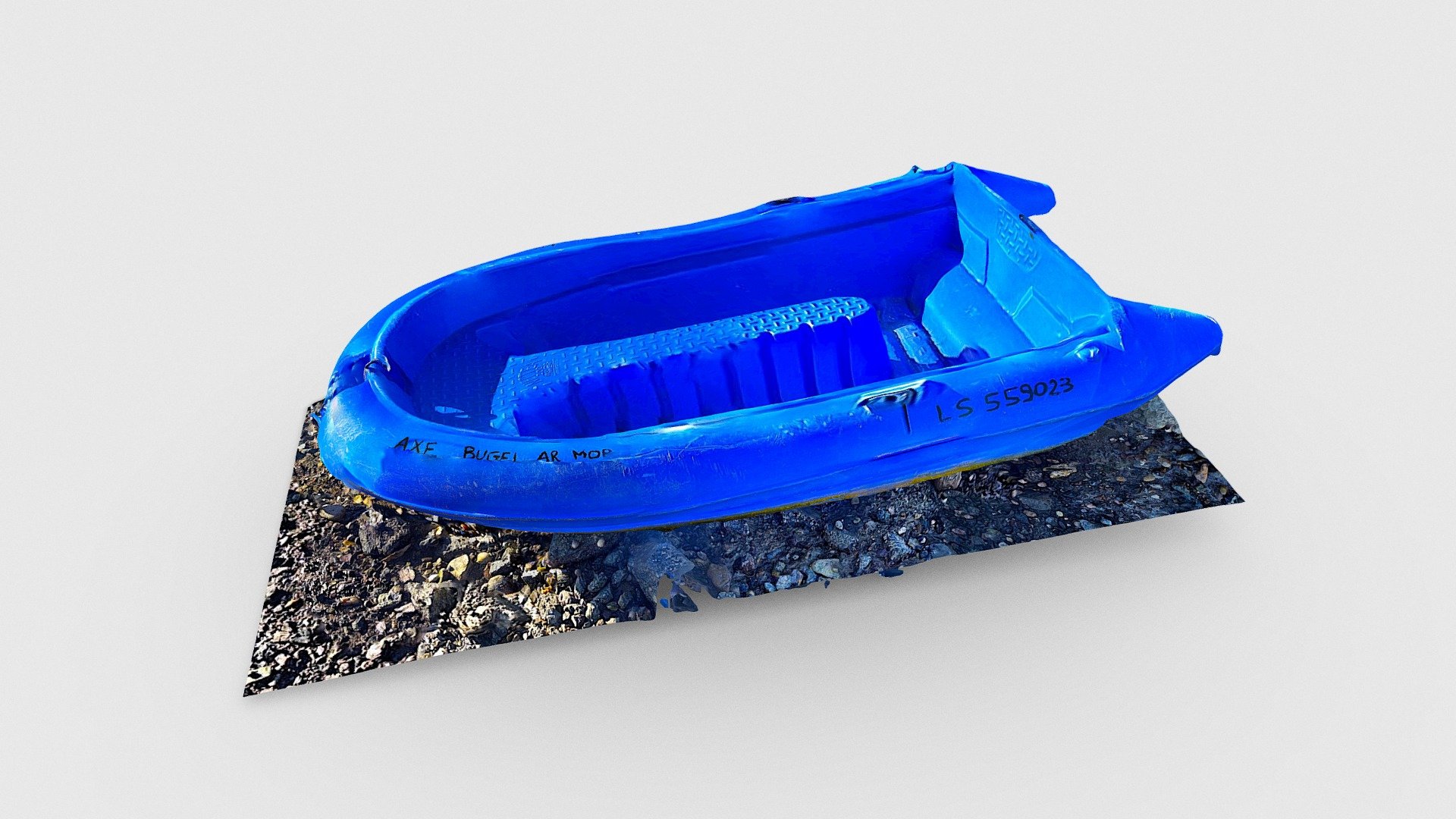 Blue tender boat, at low tide
