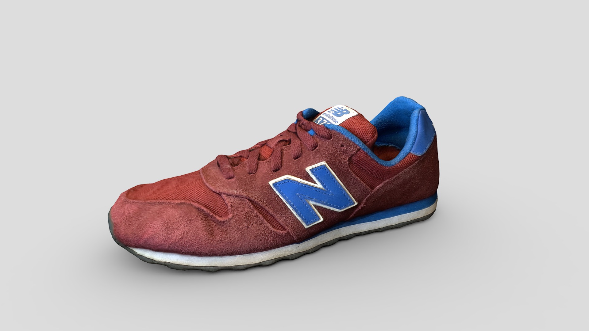 3D model New Balance 373 - This is a 3D model of the New Balance 373. The 3D model is about a brown and blue shoe.