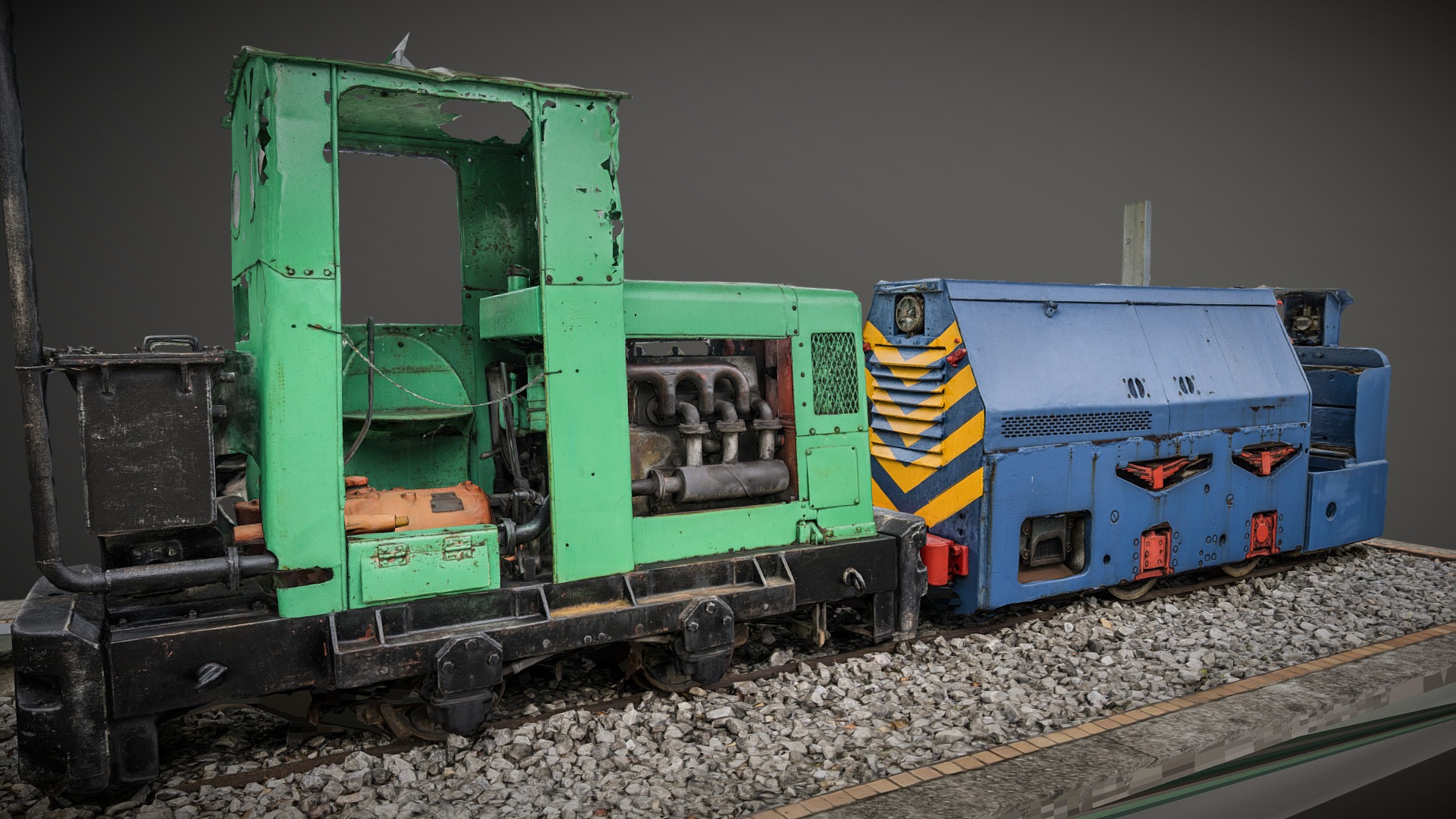 3D model Locomotive La Camocha raw photogrammetry scan - This is a 3D model of the Locomotive La Camocha raw photogrammetry scan. The 3D model is about a green and blue train engine.