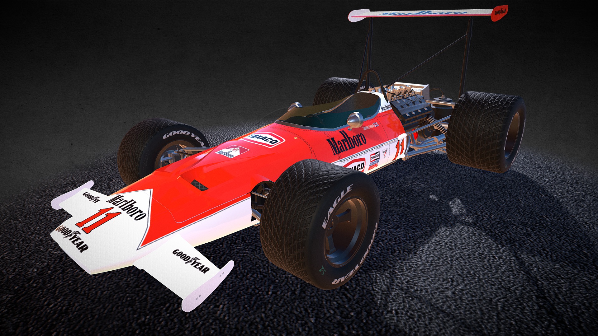 3D model Mclaren M7b - This is a 3D model of the Mclaren M7b. The 3D model is about a race car on a black surface.