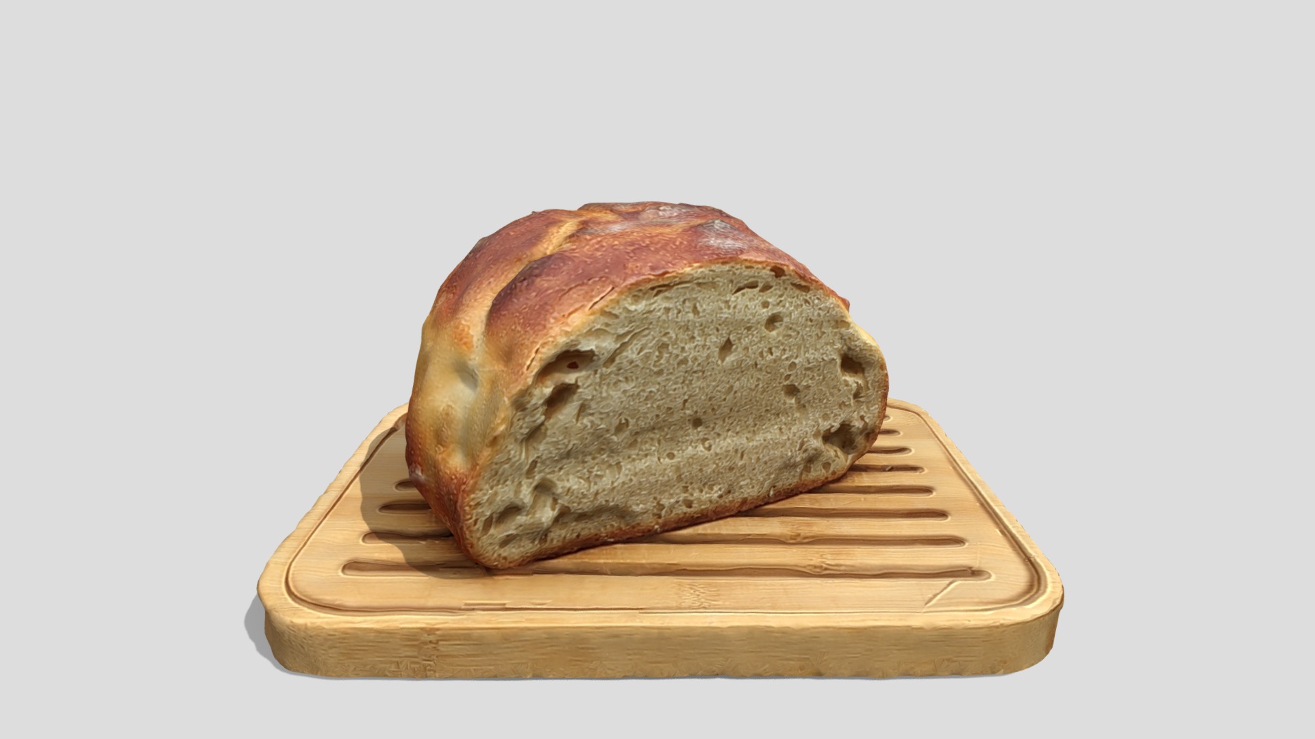 3D model Homemade bread on bamboo (April 2020) - This is a 3D model of the Homemade bread on bamboo (April 2020). The 3D model is about a loaf of bread on a wooden board.