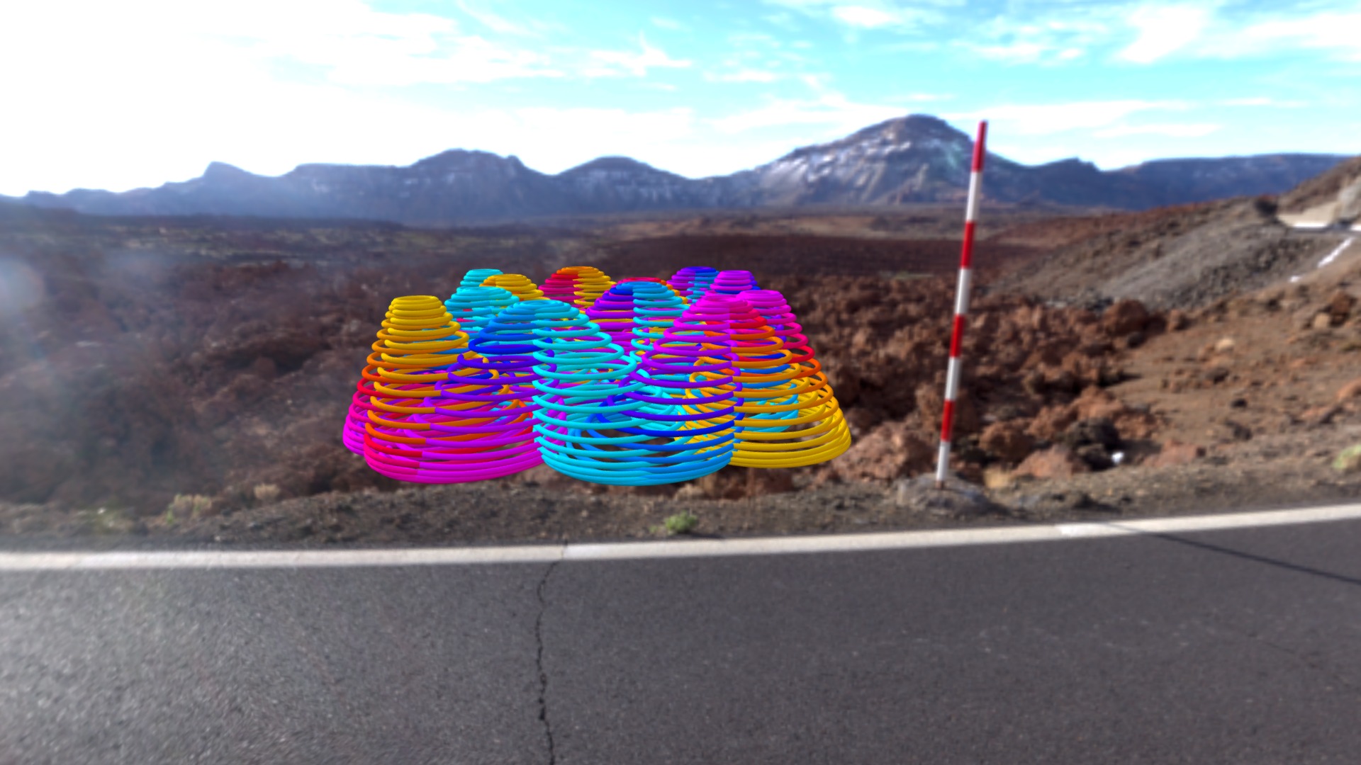 3D model springy mountains - This is a 3D model of the springy mountains. The 3D model is about a road with a rainbow painted on it and mountains in the background.