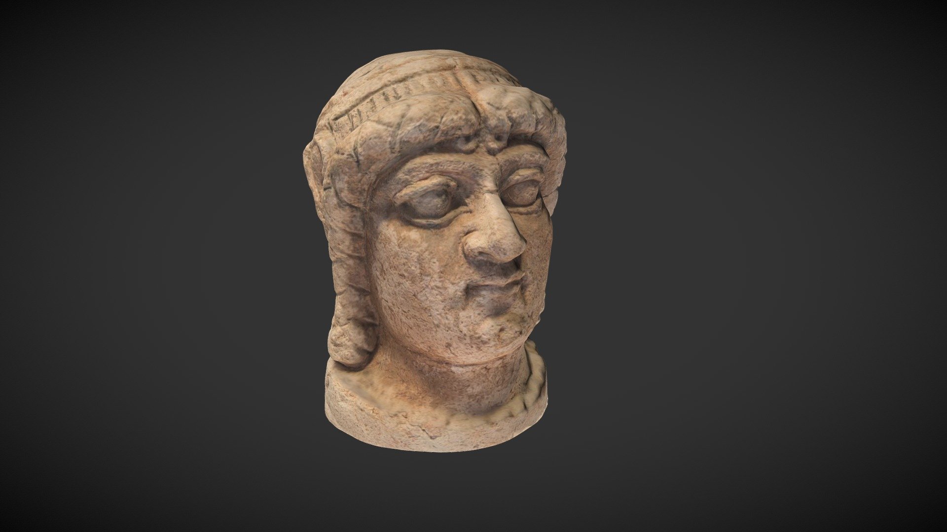 Clay figurine of a female head with braided hair