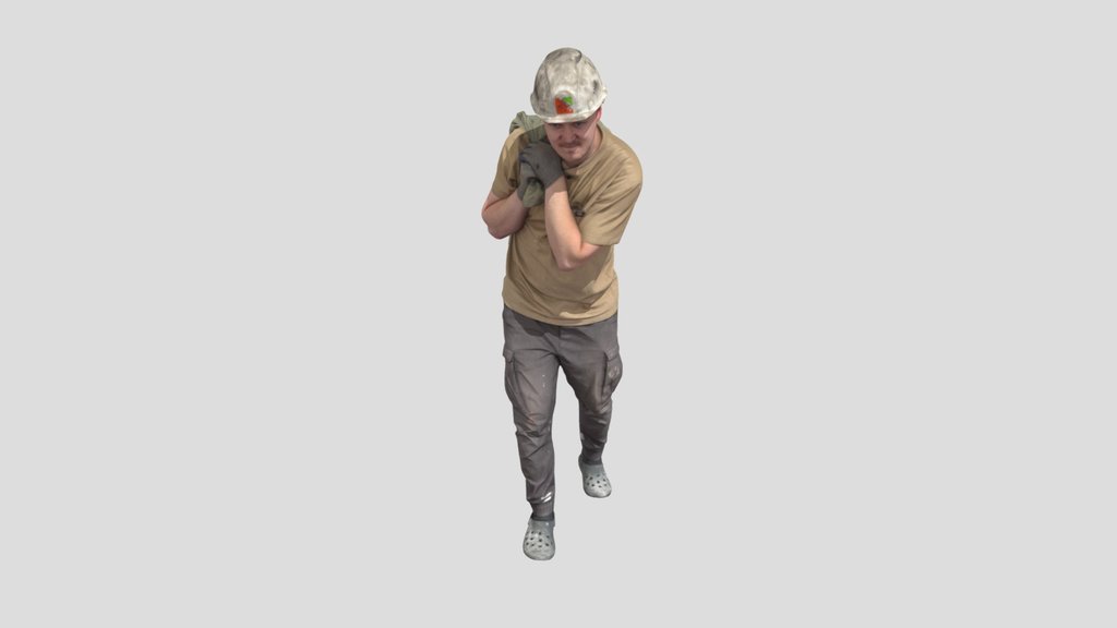 Worker Carries A Bag On His Shoulder