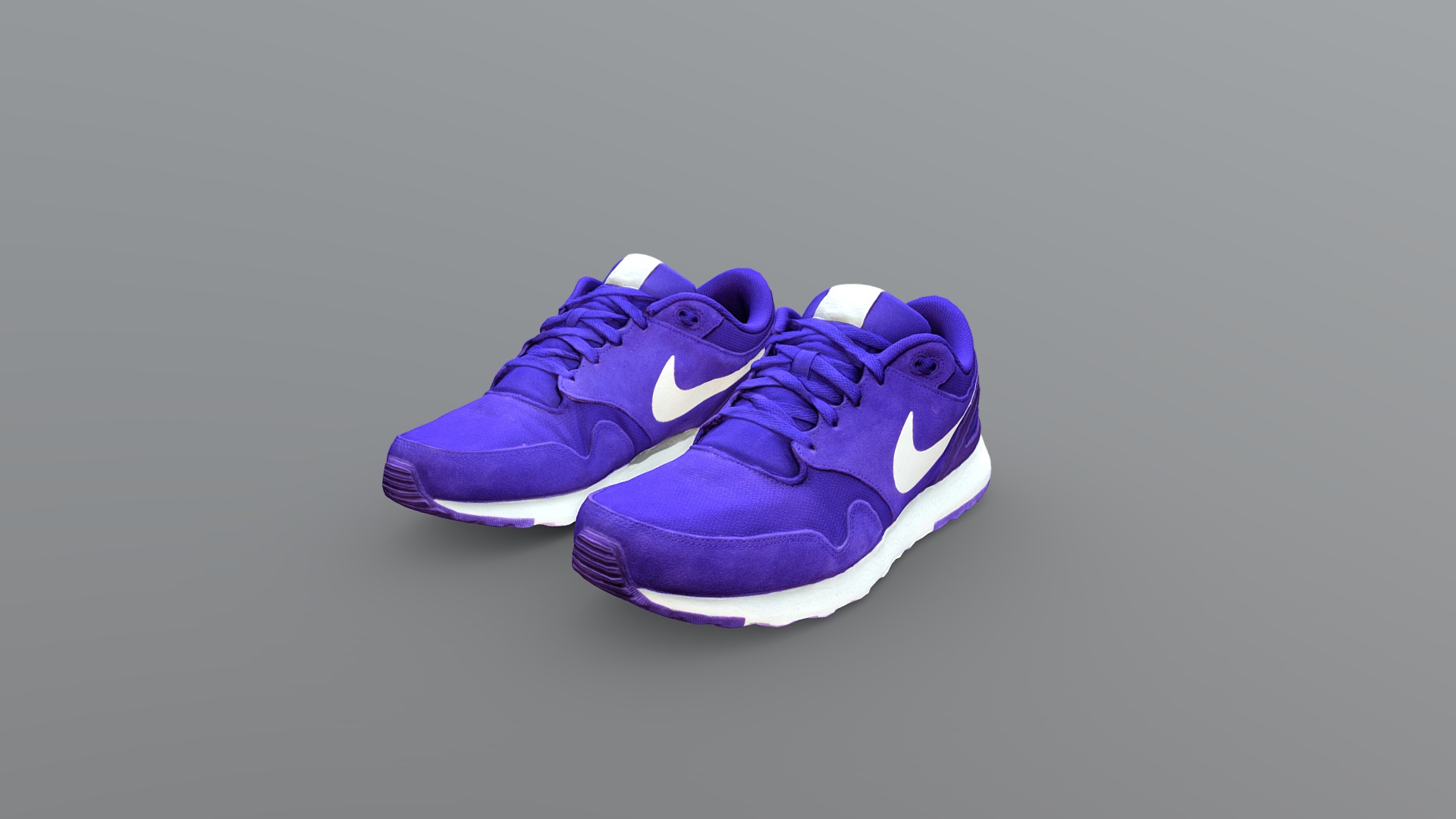 3D model Nike Shoes - This is a 3D model of the Nike Shoes. The 3D model is about a pair of purple shoes.
