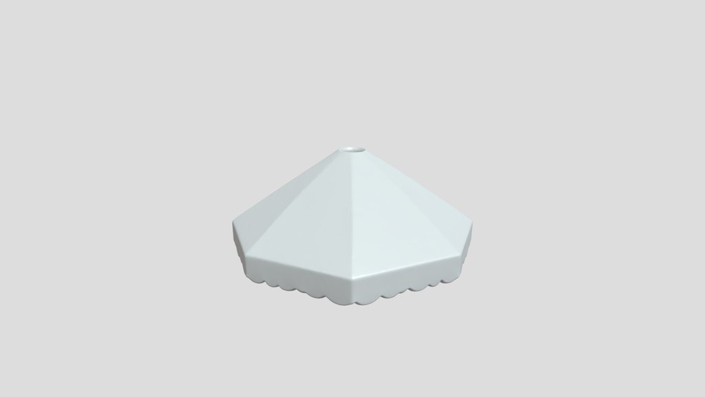 Small yellow tent-shaped plastic object