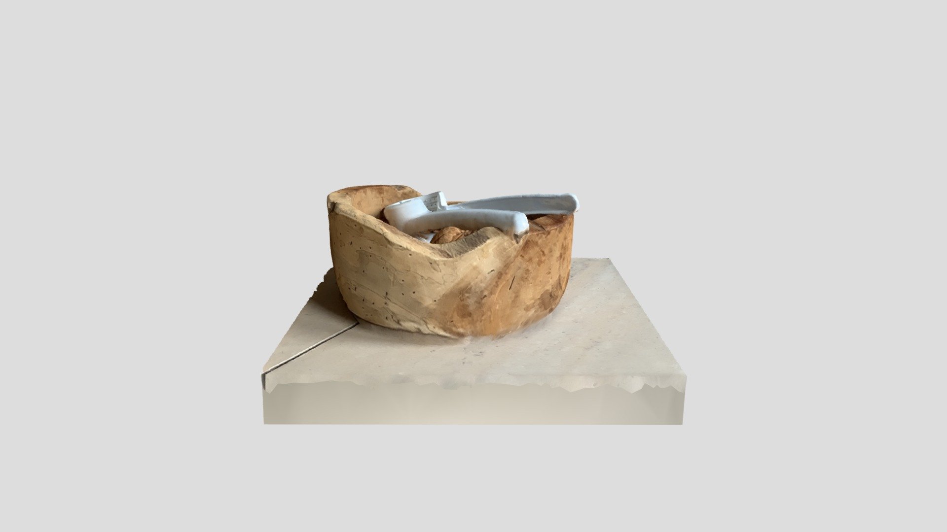 Bowl with nuts and cracker