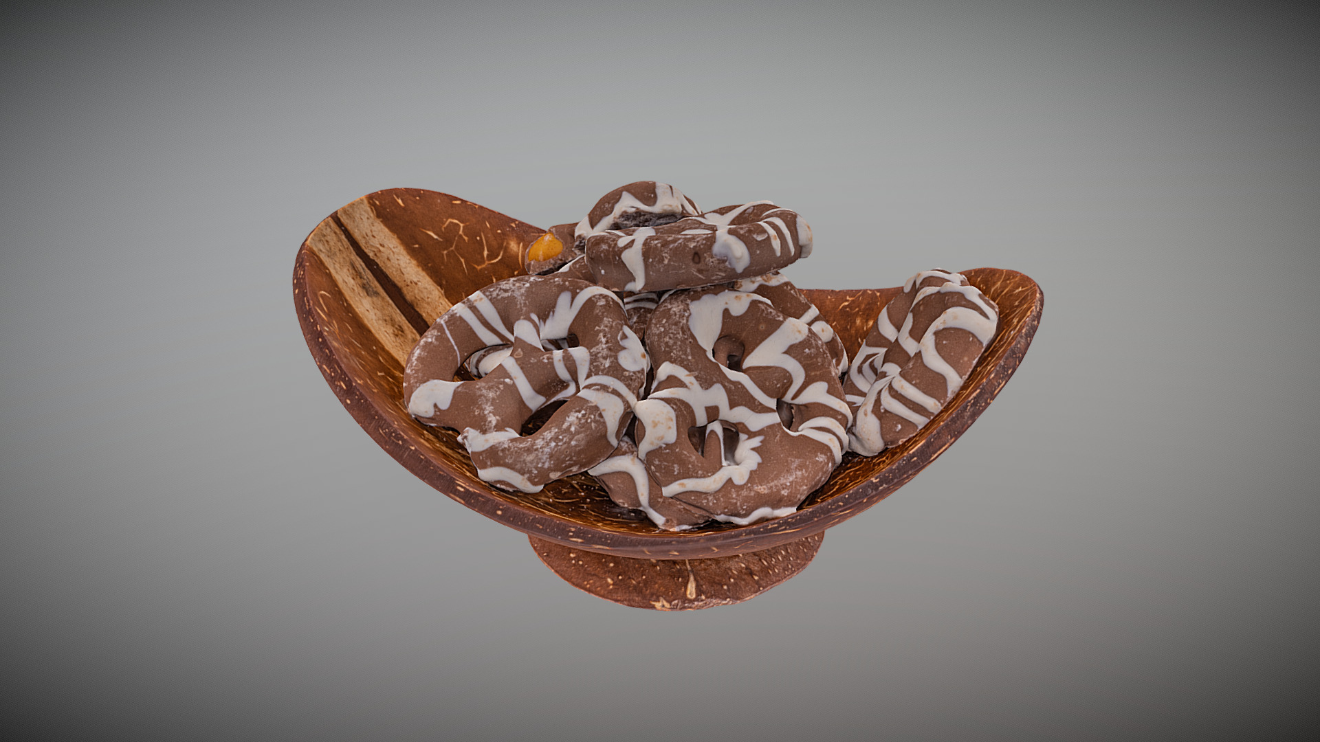 3D model Chocolate Covered Pretzels in Coconut Bowl - This is a 3D model of the Chocolate Covered Pretzels in Coconut Bowl. The 3D model is about a chocolate candy bar.
