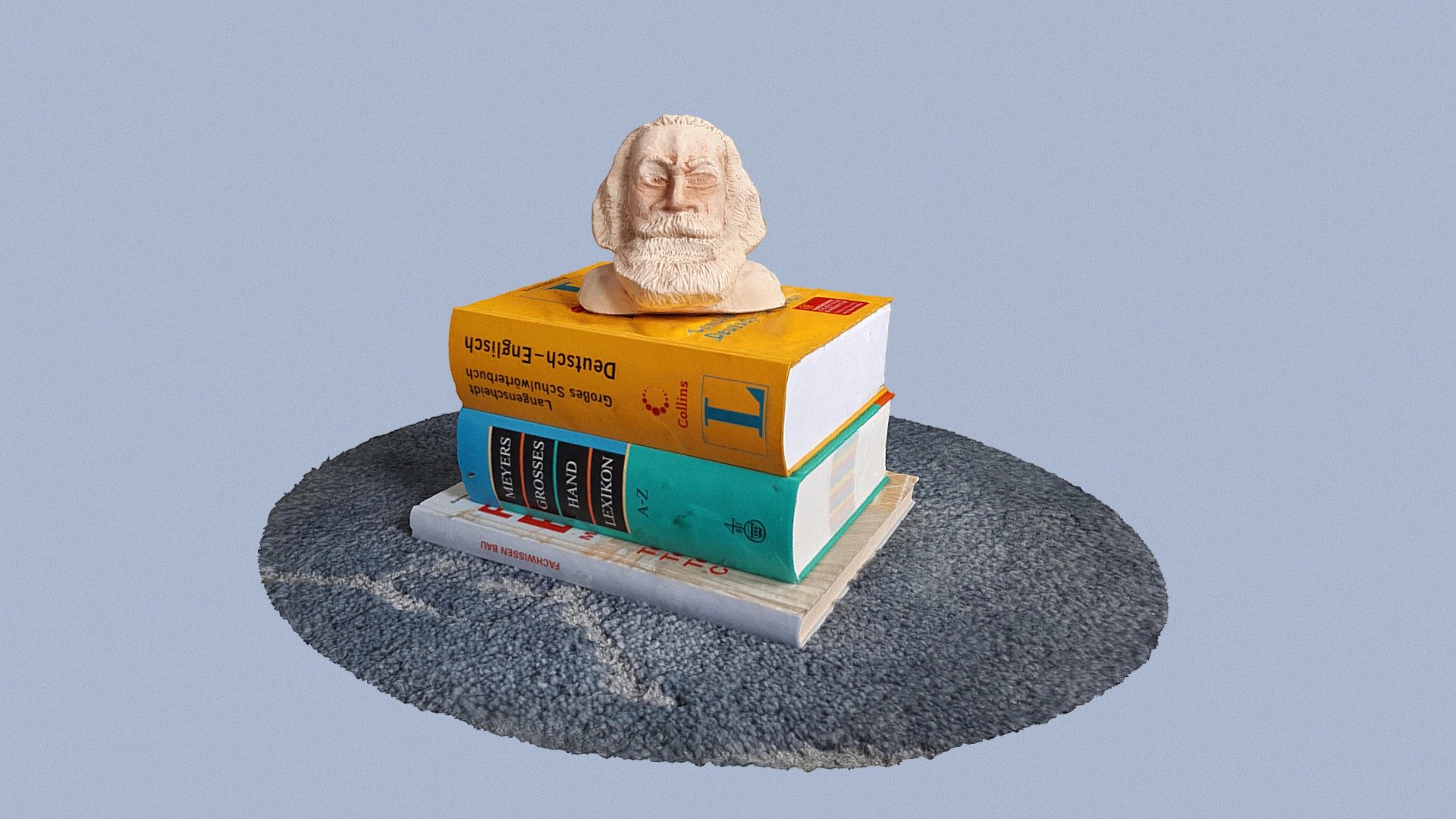 Karl Marx auf Bücherstapel