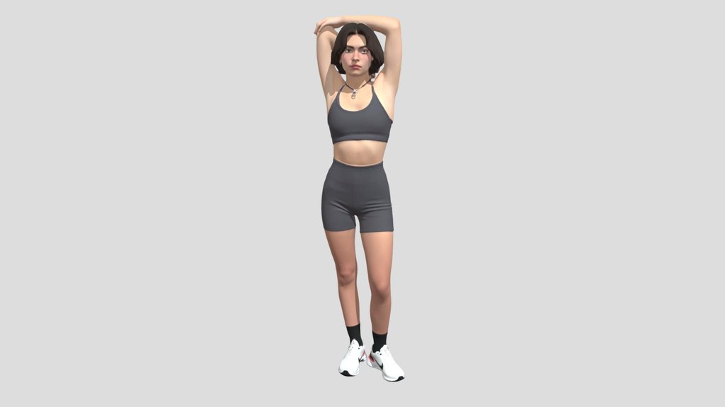 Stretching in a Gray Workout Set