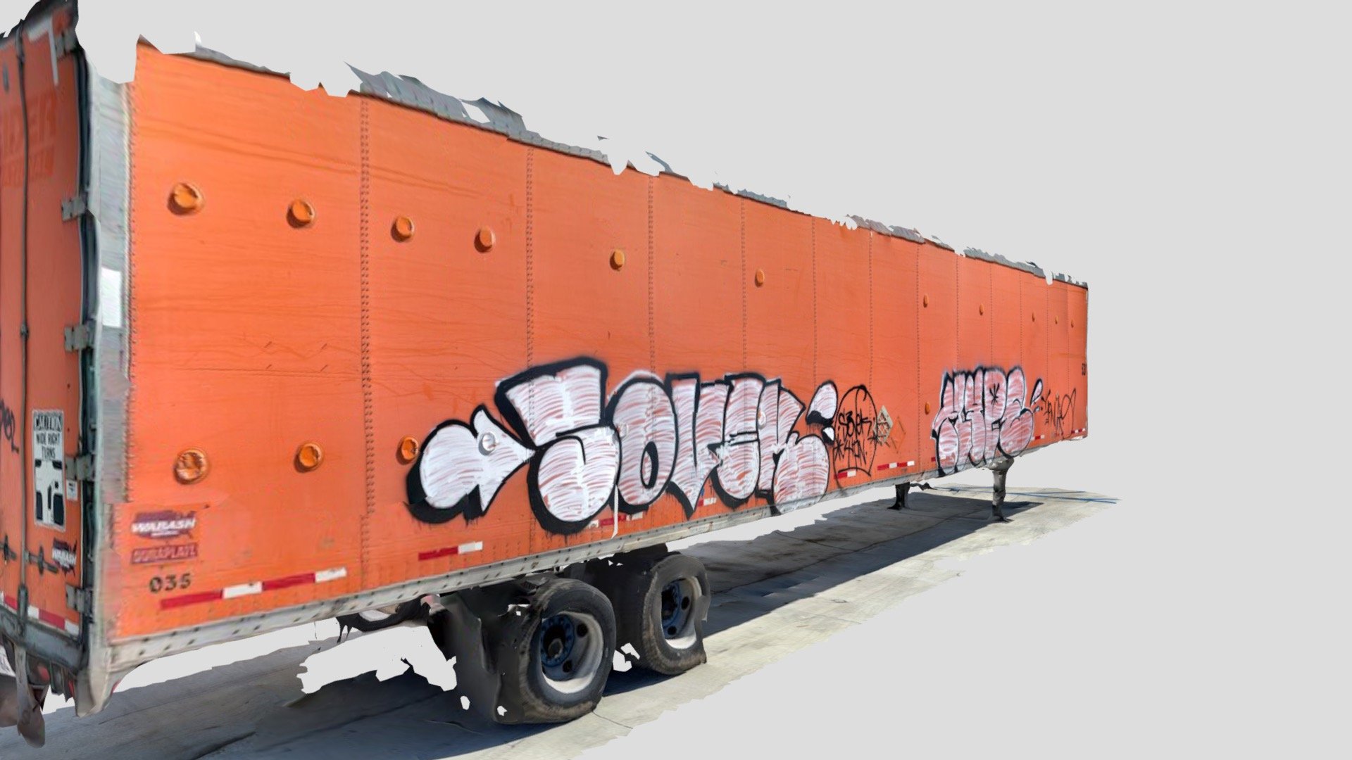 Orange Tractor trailer Tagged with LA Graffiti.