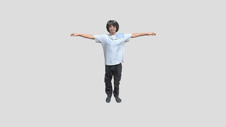 Person standing outdoors with arms outstretched