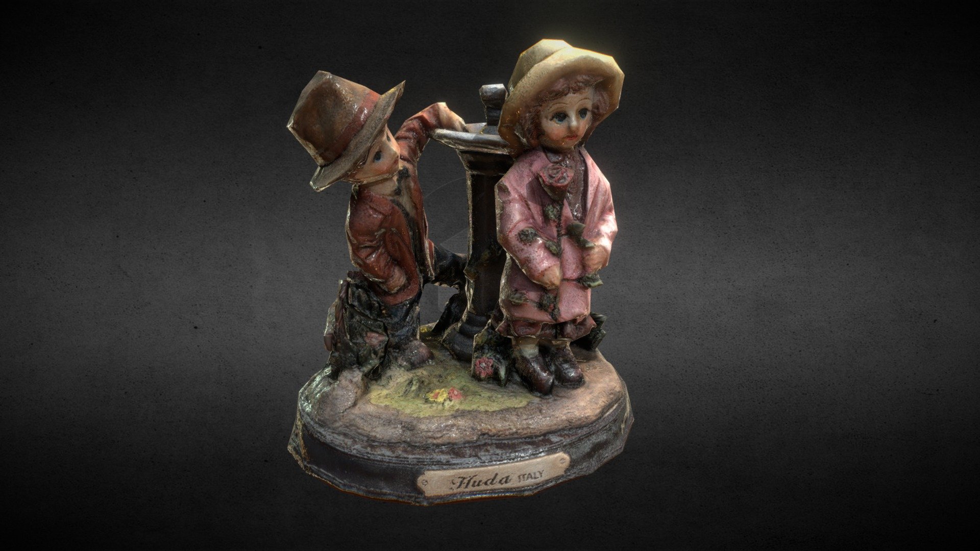 Low-poly statuette is a boy with a girl