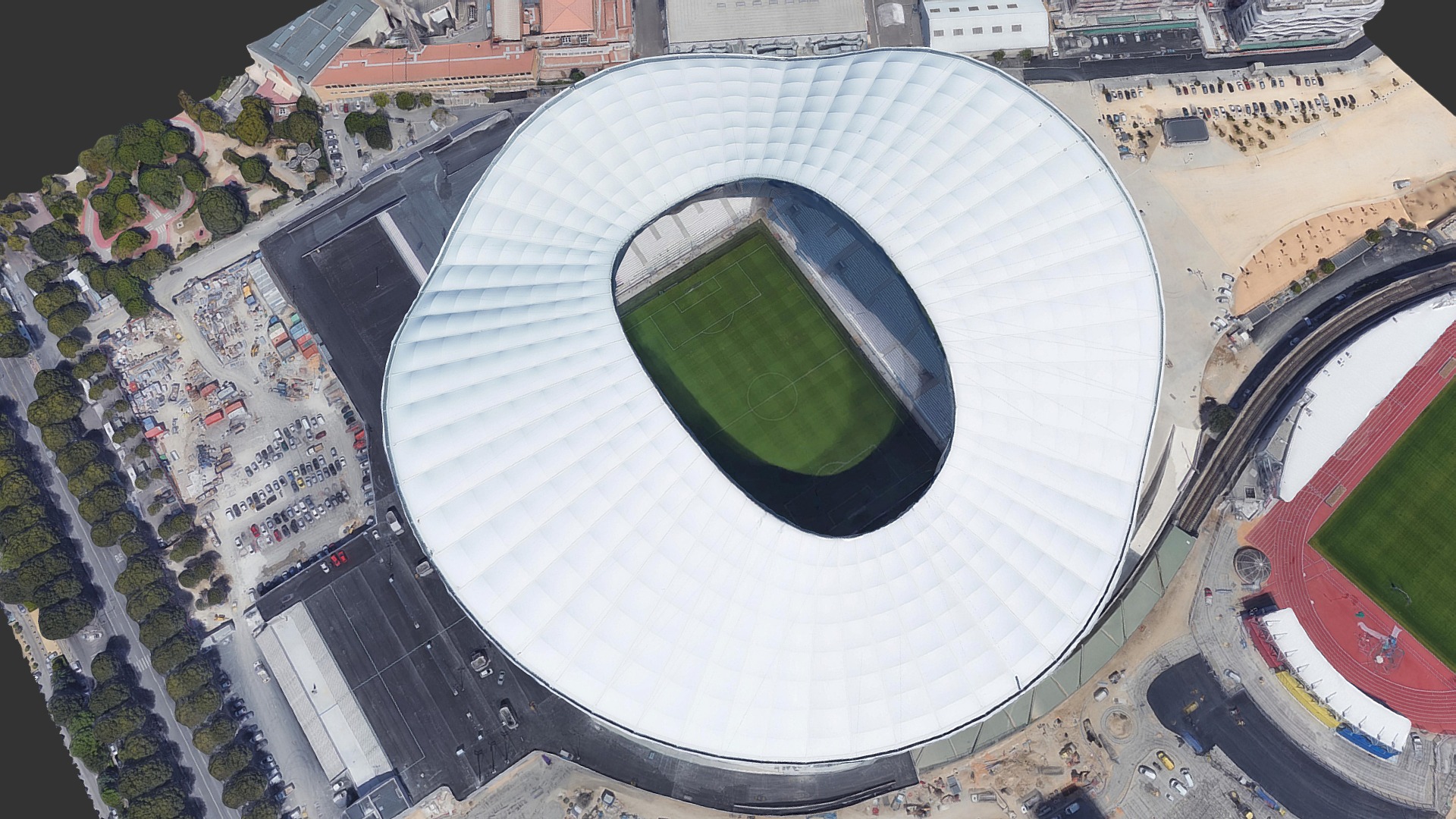 3D model Stade Vélodrome / Marseille - This is a 3D model of the Stade Vélodrome / Marseille. The 3D model is about a large stadium with a green field.