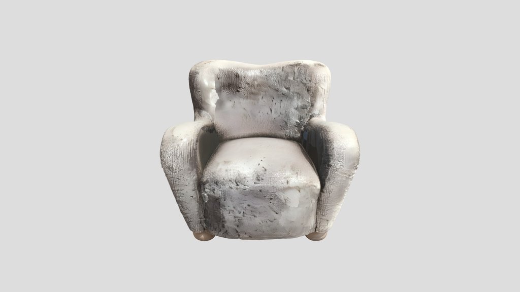 Plush upholstered armchair with rounded silhoue