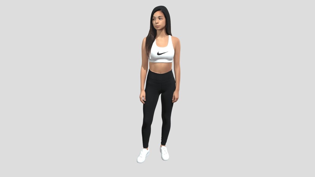 Fitness Model In Sports Bra And Black Leggings