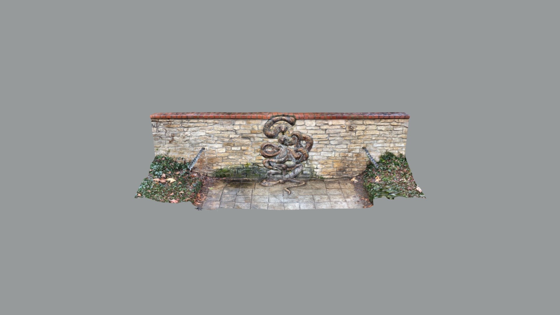 Relief of a snake in the Alley of Victims of To…