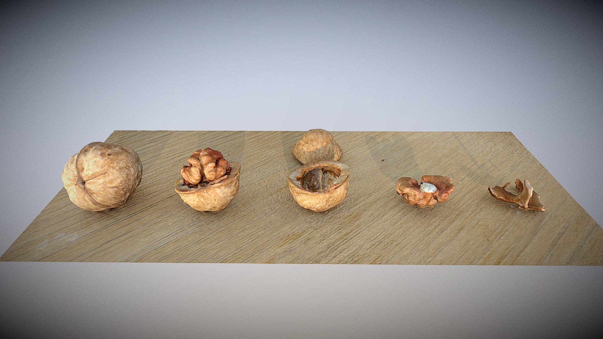 3D model Walnut at different stages of cleaning – SCAN - This is a 3D model of the Walnut at different stages of cleaning - SCAN. The 3D model is about a group of mushrooms on a wooden surface.