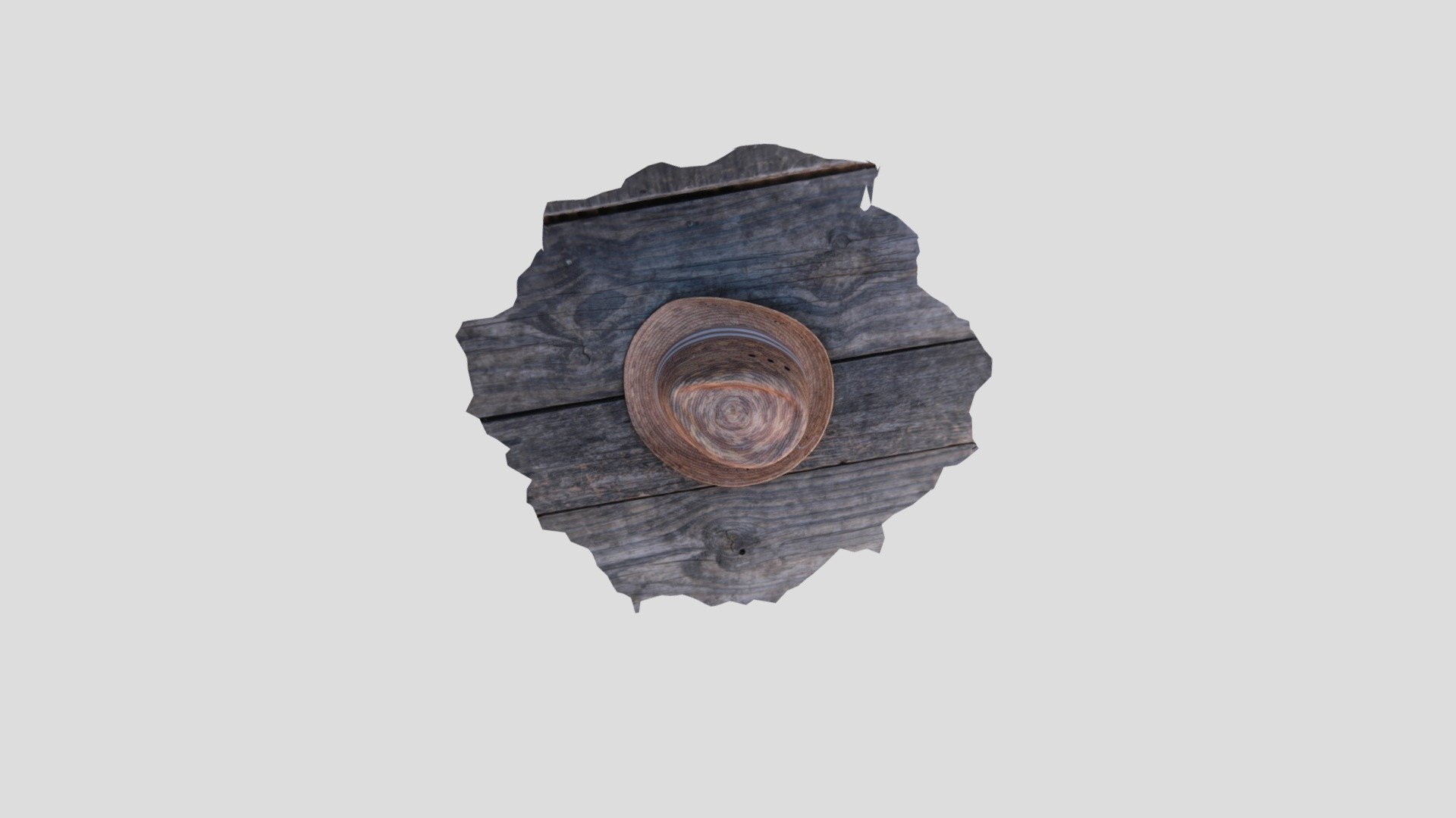 Sombrero de playa sobre madera