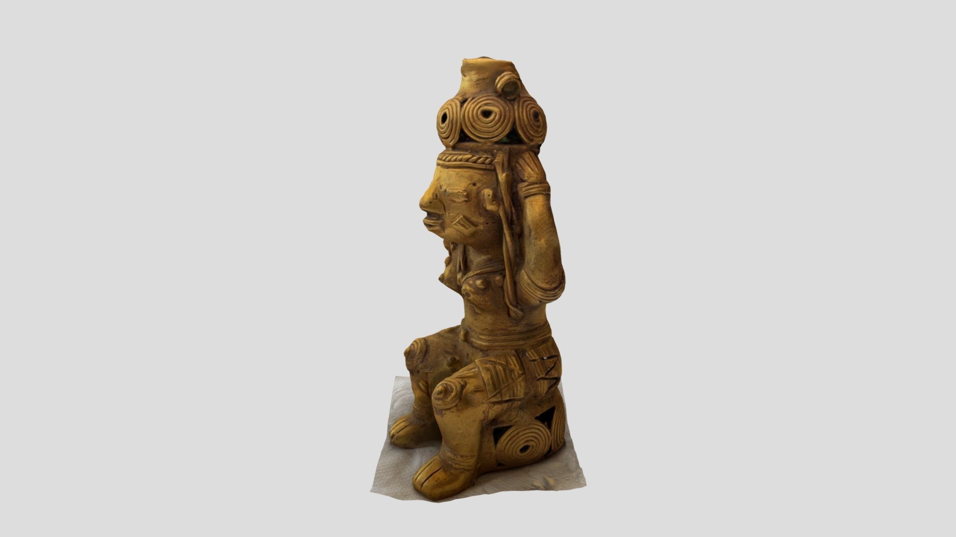 Woman seated with pot sculpture
