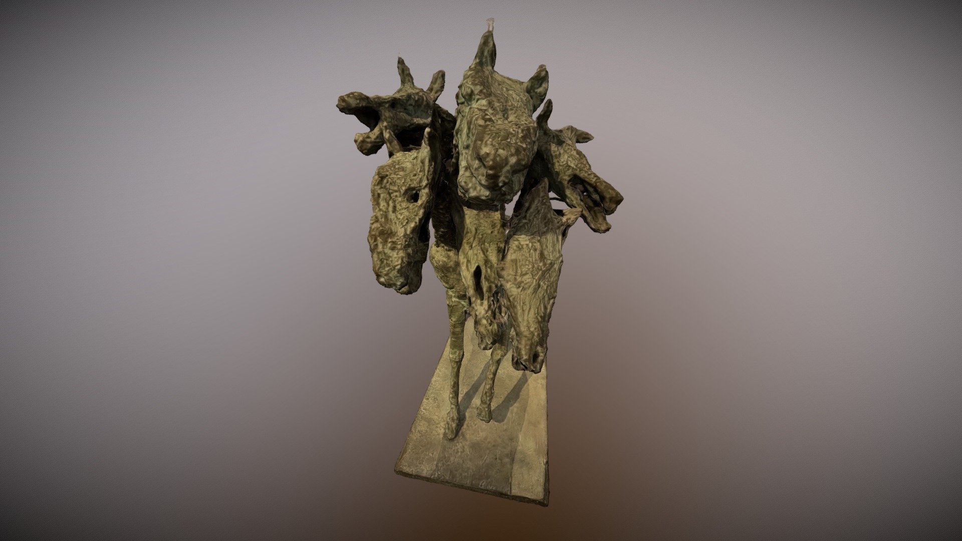 Multi-head dog sculpture
