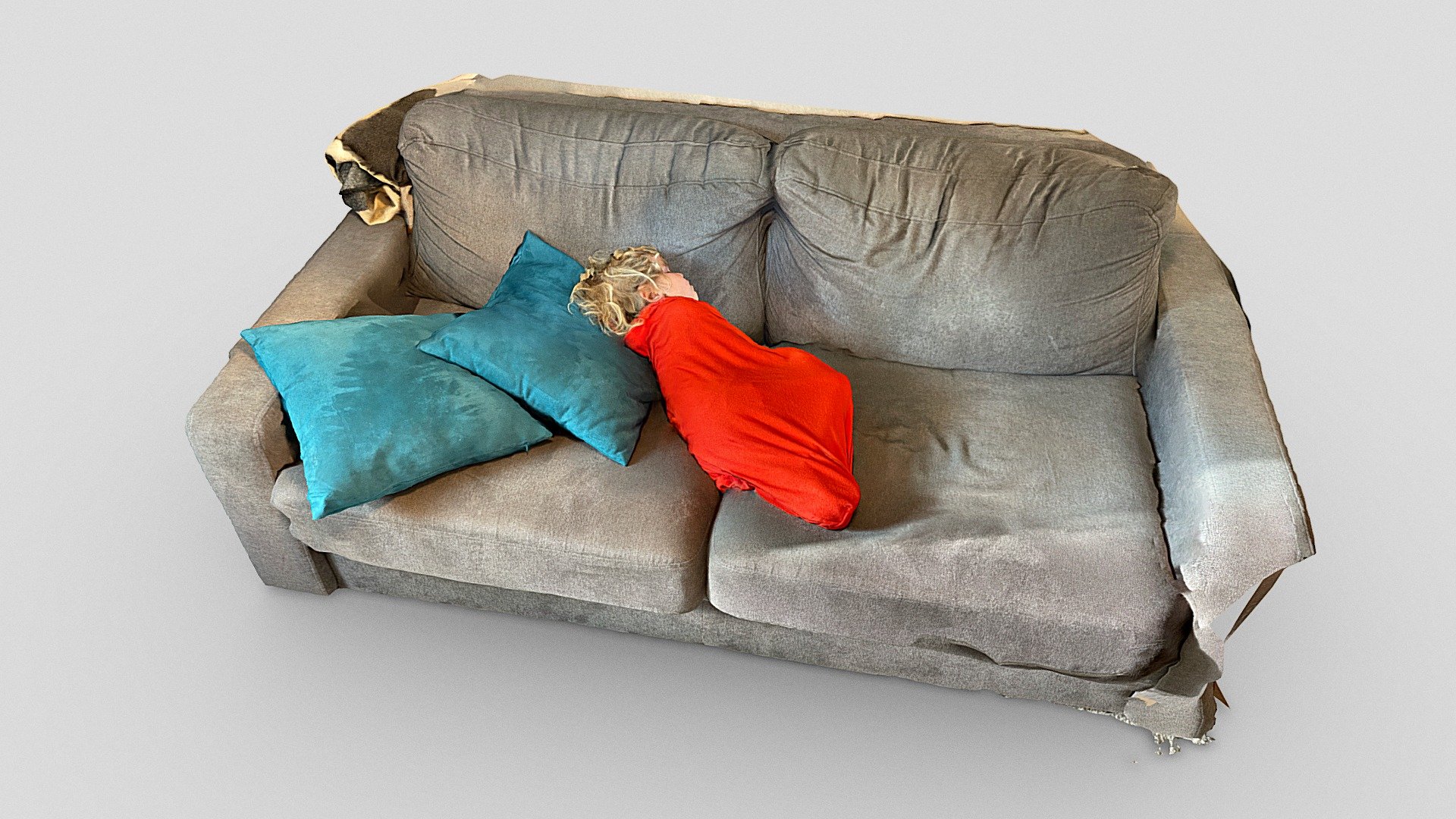 Kid sleeping on a couch