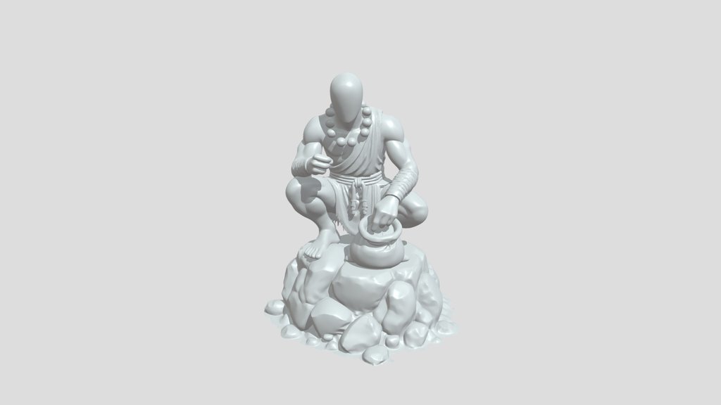 Turquoise humanoid statue on rocks