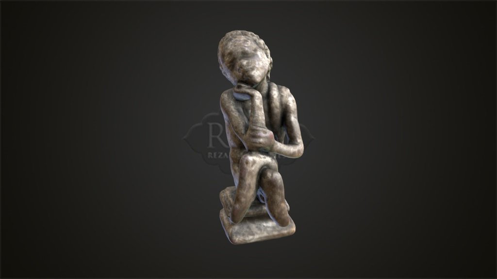 12 - Seated African Figurine