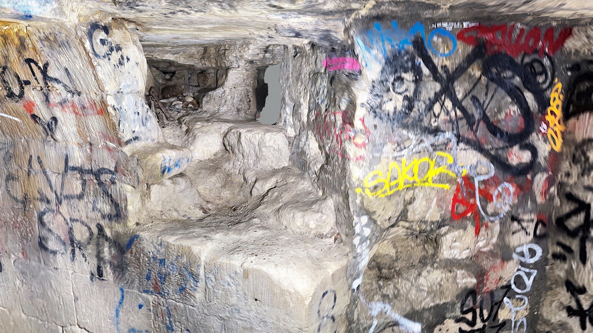 Paris catacombs - Bones next to a squeeze