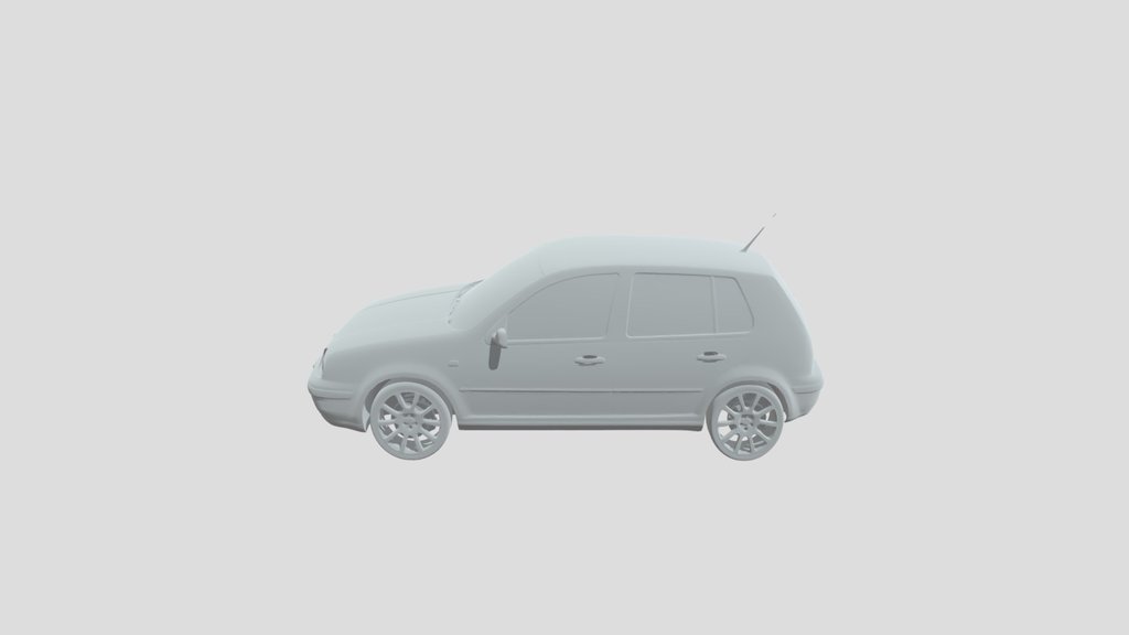 Blue Volkswagen Polo in a driveway
