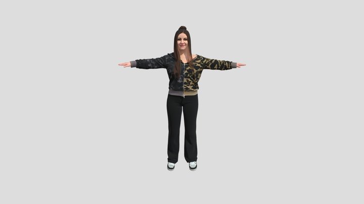 Woman standing with arms outstretched