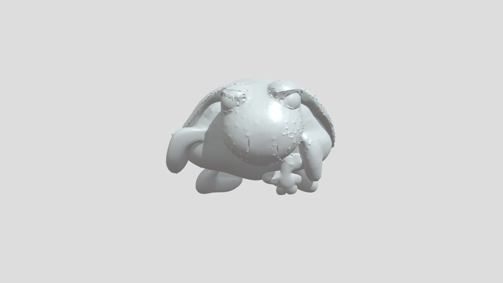 plush frog holding a small toy