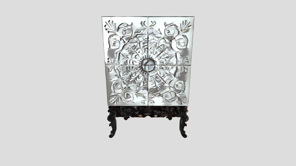 Ornate carved decorative cabinet