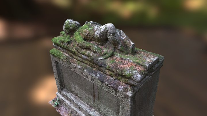 Old overgrown gravestone
