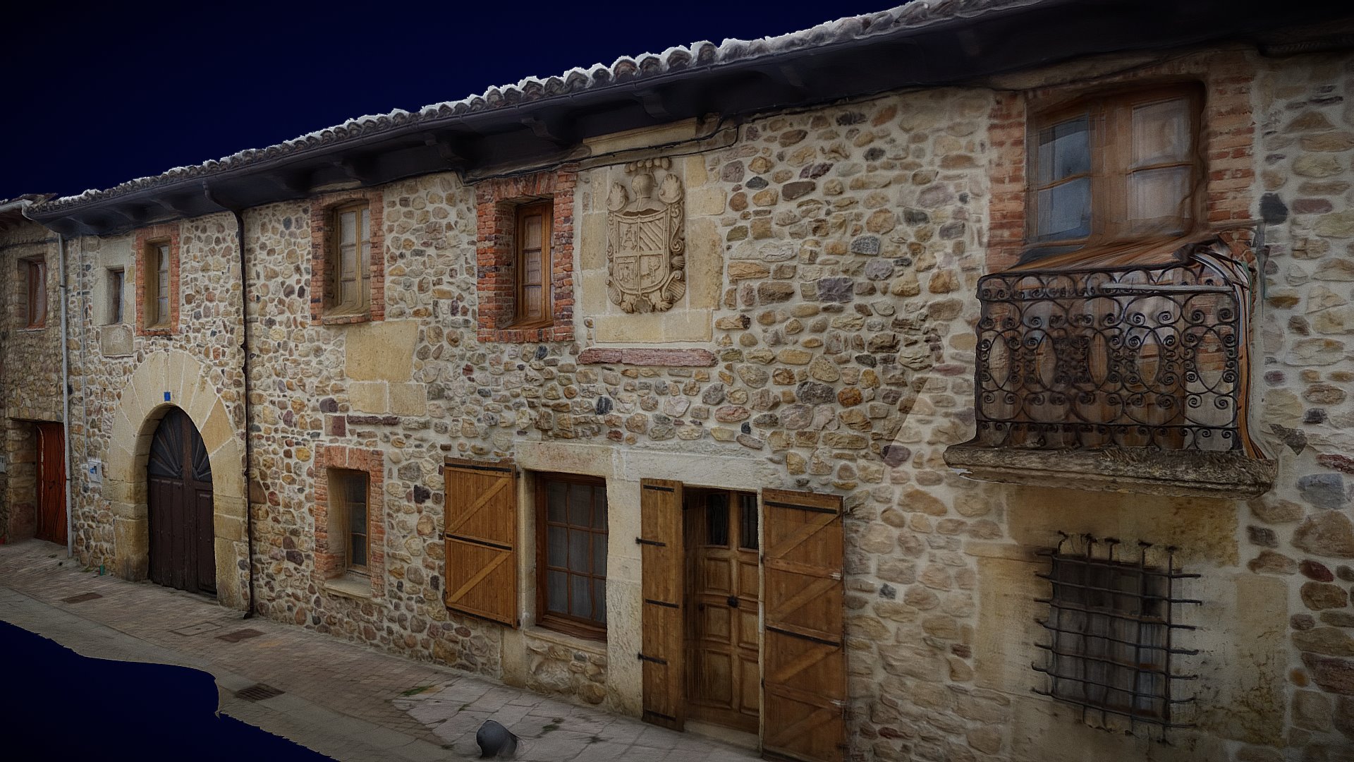 Calle con escudo nobiliario. La Vecilla (León)