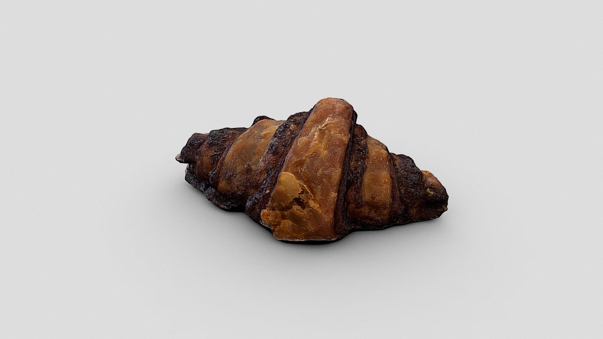 3D model Mini rugelach - This is a 3D model of the Mini rugelach. The 3D model is about a brown object with a white background.