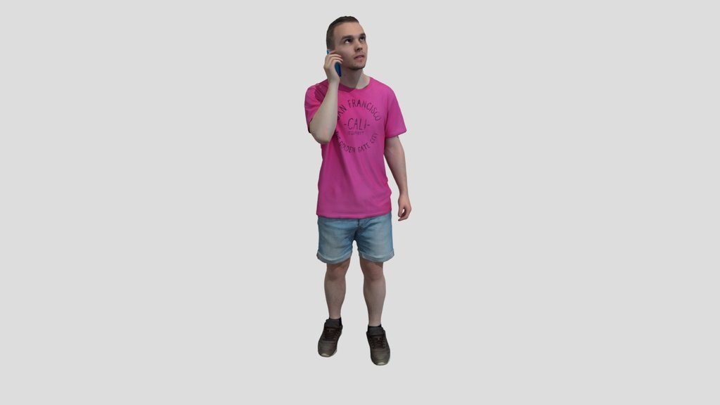 Young Guy Is Talking On The Phone