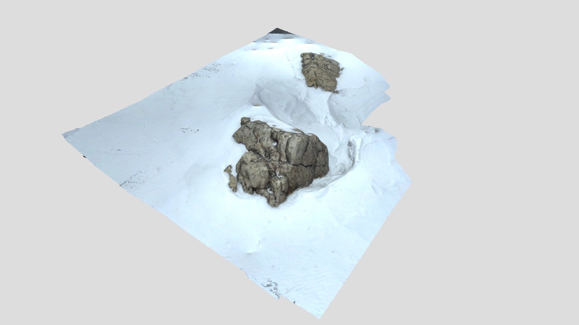 Rocks in the snow - two rocks