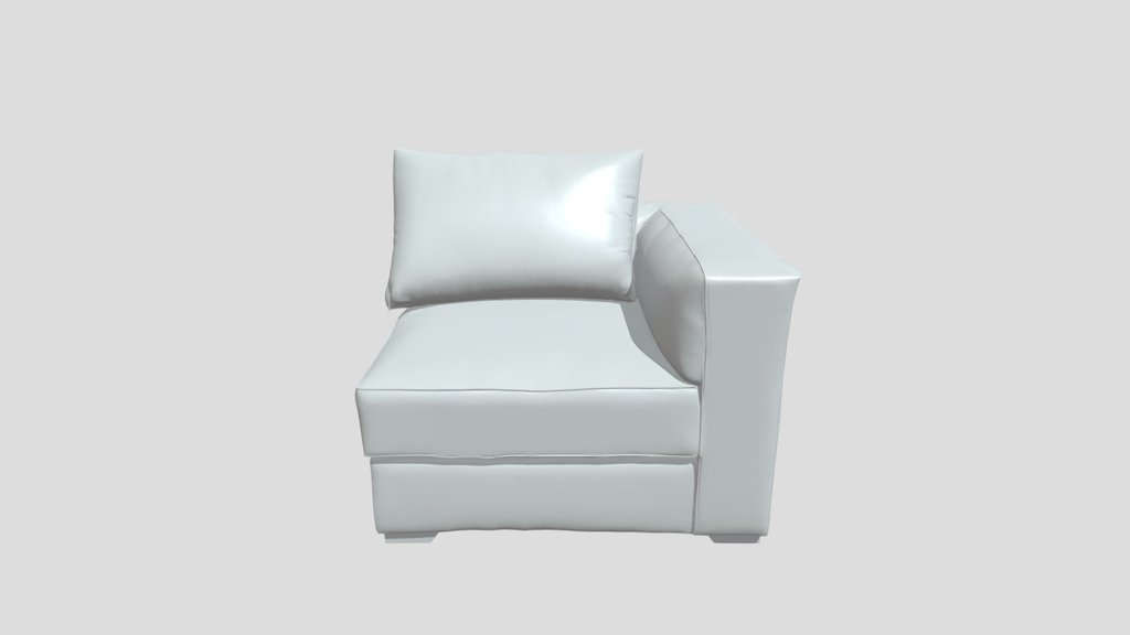 A gray armchair with a pillow
