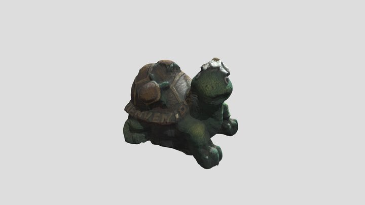 Turtle piggy bank that says "welcome" in spanish