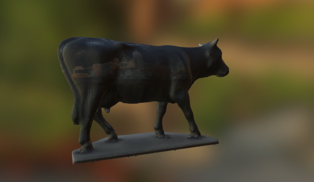 Painted cow sculpture
